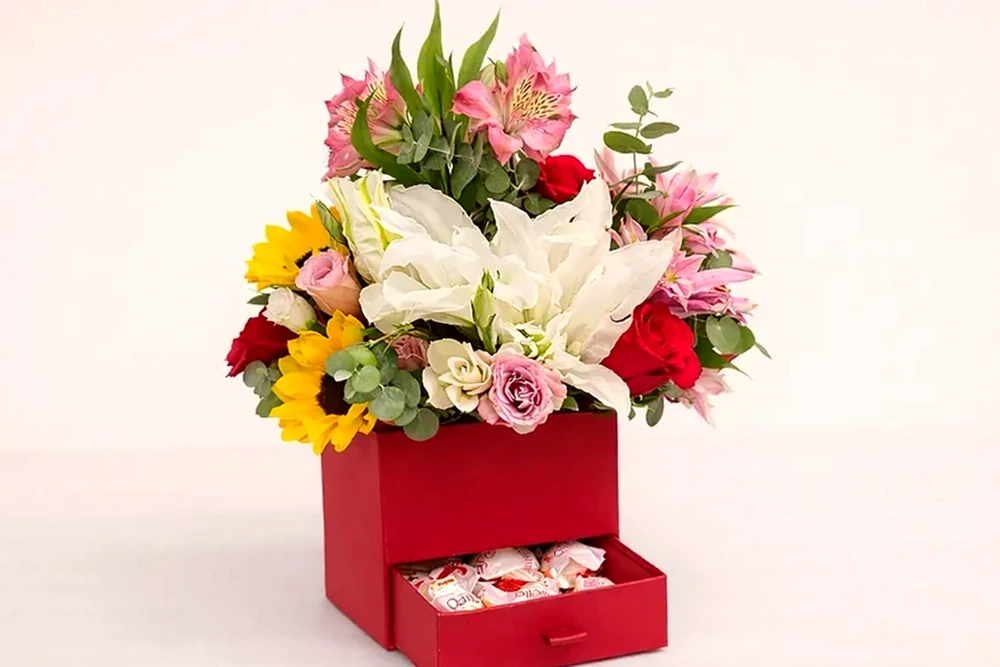 Caixa Floral Colorida com Girassol e Chocolates, imagem ilustrativa
