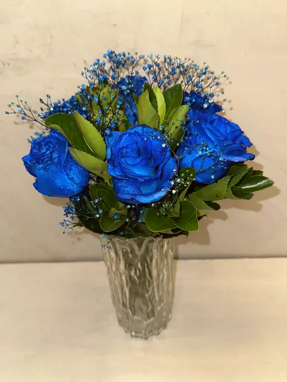 Arranjo Masculino azul com vaso vidro, imagem ilustrativa